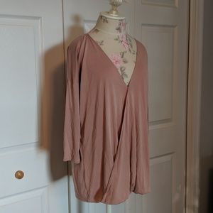 Soft pink blouse with V-neck